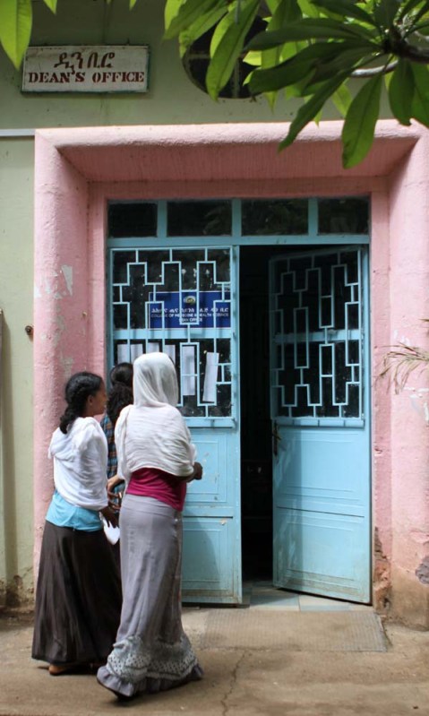 Women walk into the Dean's Office at the University of Gondar Hospital.